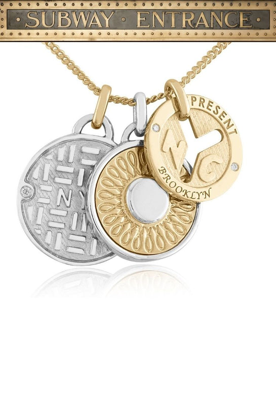 Collection of fine jewelry medallions inspired by New York City subway tokens