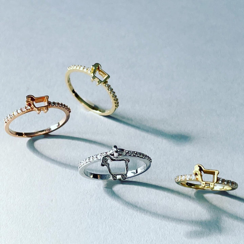 Stackable rings with lamb logo and diamonds by Julie Lamb