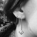 A Crosstown Chain Earring with diamond