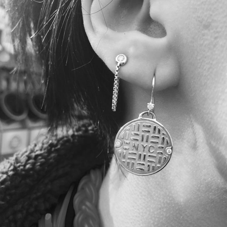 Manhole cover earrings and NYC crosstown chain earring with diamond