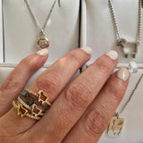 Julie Lamb BE EWE Collection stackable rings with diamonds and lamb logo