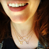 small signature diamond lamb necklace in gold and silver