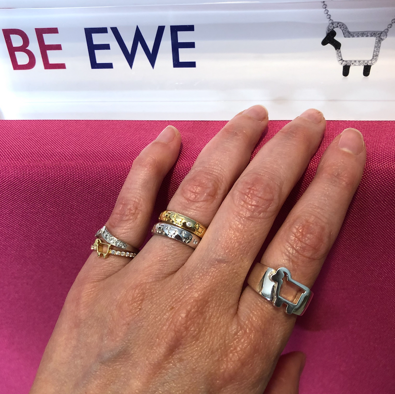 Model worn BE EWE collection rings with diamonds