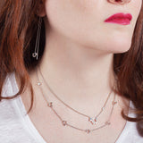 Be EWE collection Lamb necklace and earrings in silver on model