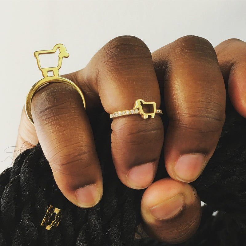 Yellow Gold BE EWE Collection rings on fingers