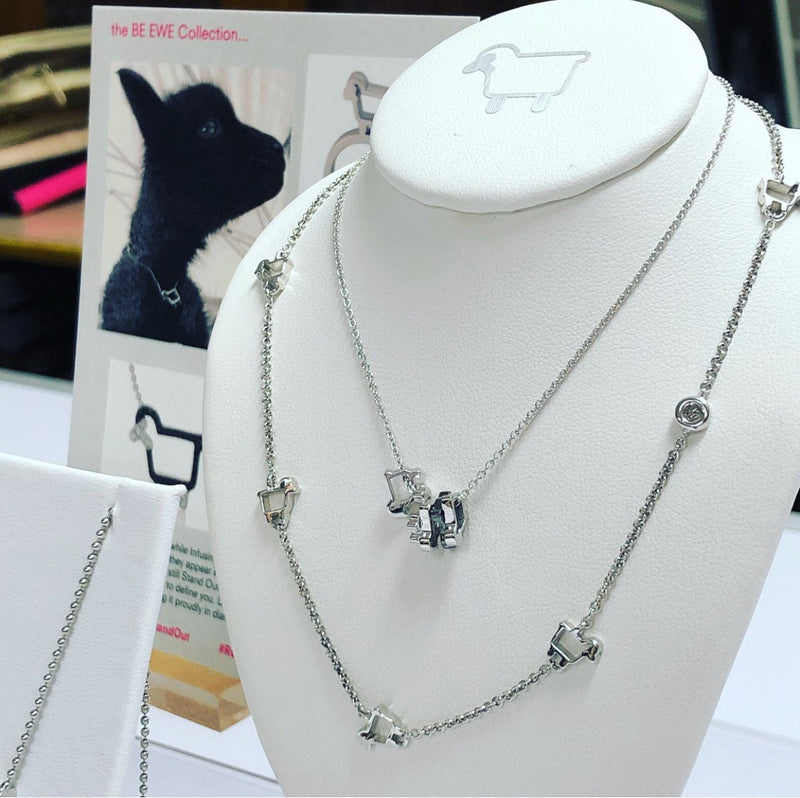 sterling lamb necklaces with a diamond