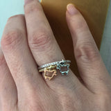 Lamb logo charm rings with diamonds shown worn on finger