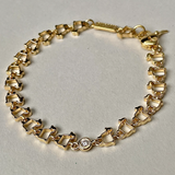 18K lamb logo link bracelet with heart clasp and diamond